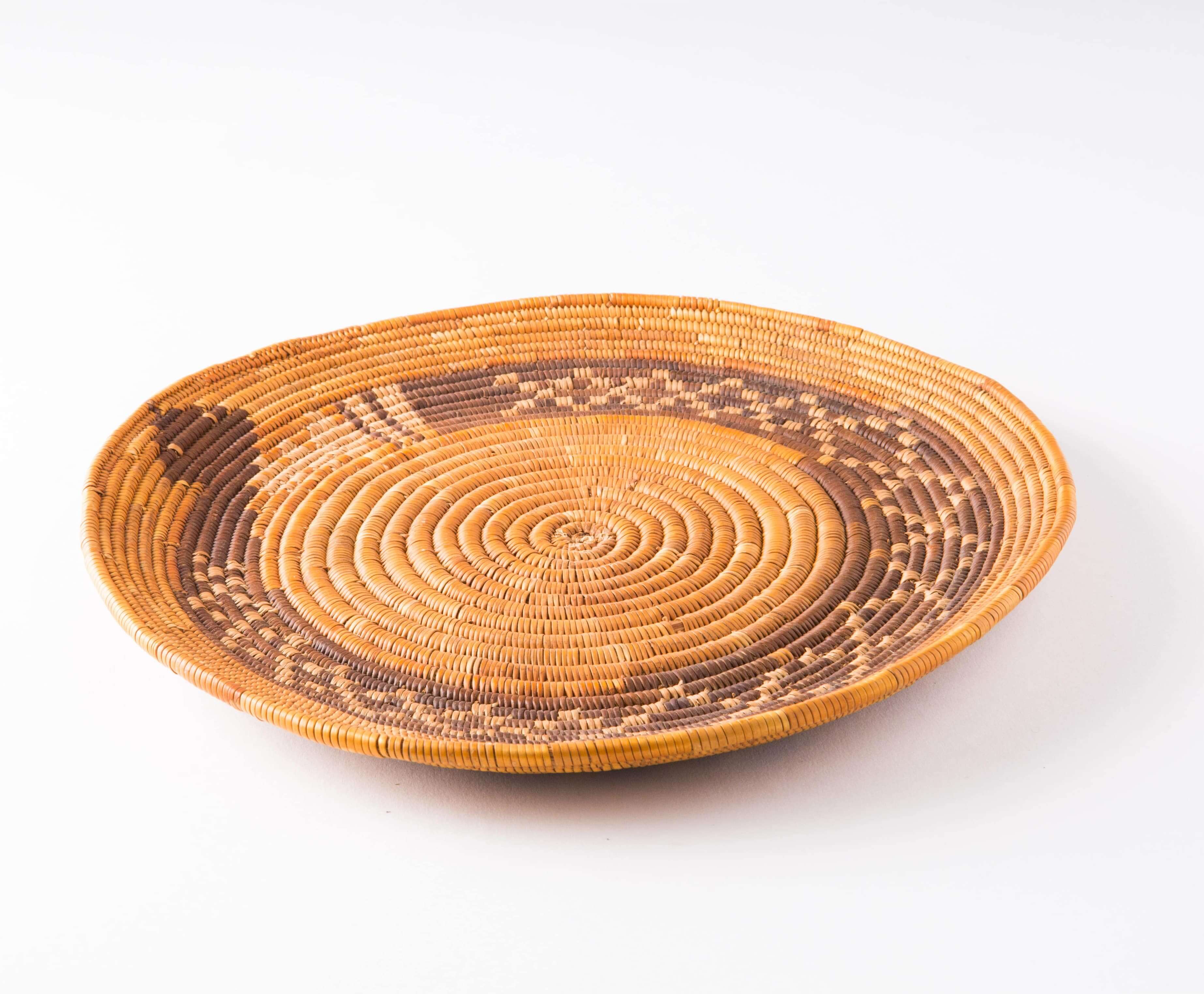 A Cahuilla basket featuring a rattlesnake design.